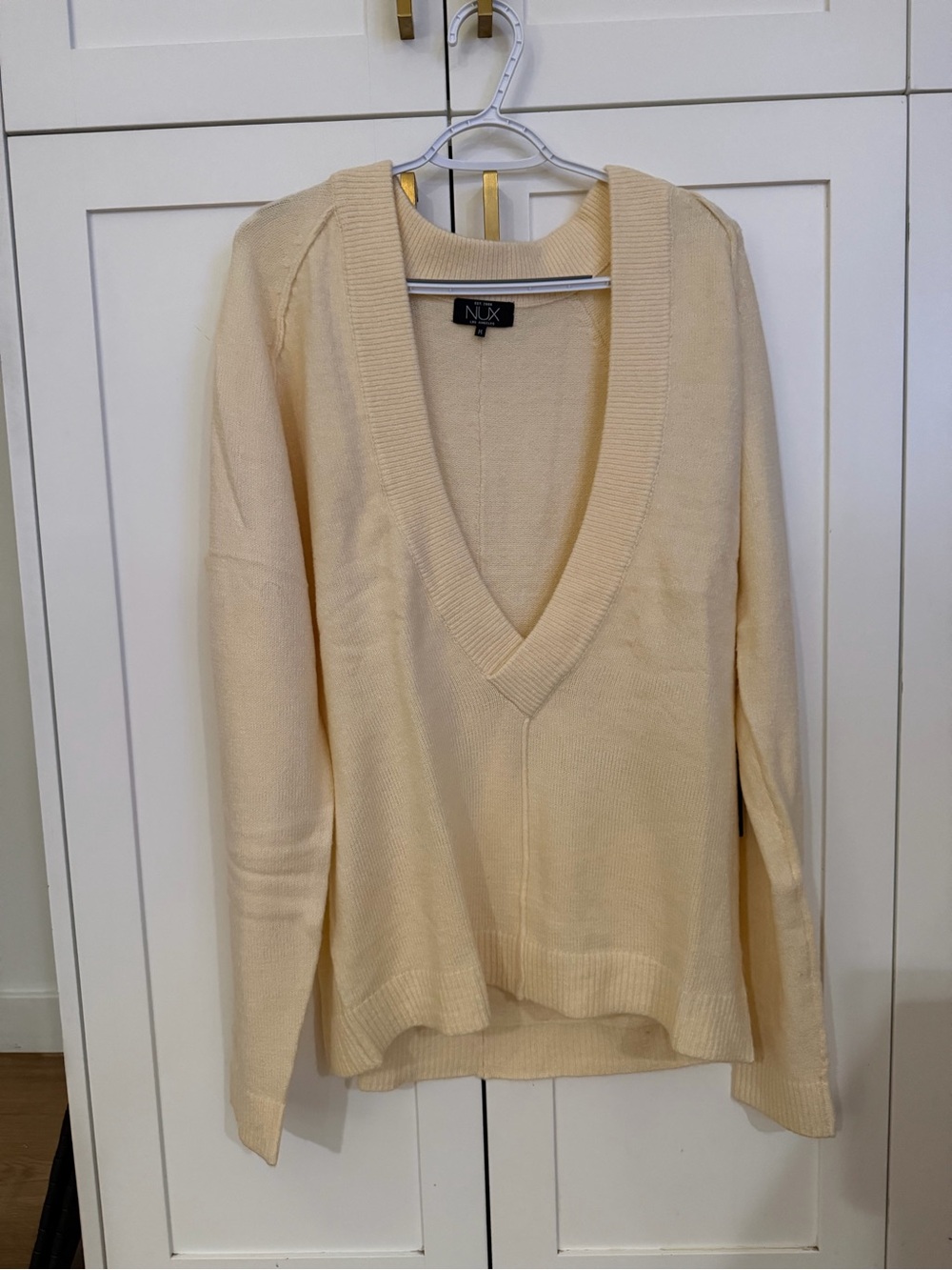 NUX Cream Deep V-Neck Sweater